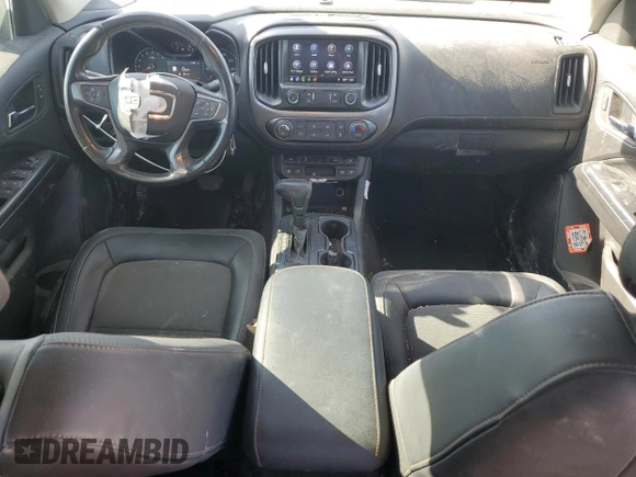 2021 GMC Canyon 4WD AT4 w/Leather with VIN 1GTG6FEN0M1122894, listed as a Copart auction lot 85734544 with 108,366 mi miles and Salvage Title. Bid and sale history available at carsss.com. Image 8.