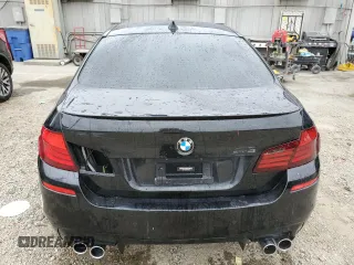 2013 BMW M5 z VIN WBSFV9C56DD096294, wystawiony jako Copart lot #57855005 z przebiegiem Nie podano mil oraz Tytuł czysty. Historia ofert i sprzedaży dostępna na DreamBid. Obrazek 6.