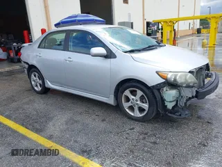 2013 Toyota Corolla L with VIN 5YFBU4EE7DP209207, listed as a IAAI auction lot 41990086 with 168,269 mi miles. Bid and sale history available at carsss.com. Image 1.