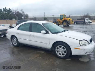 2002 Mercury Sable GS with VIN 1MEFM50U92A637611, listed as a IAAI auction lot 41805561 with 140,698 mi miles. Bid and sale history available at carsss.com. Image 1.