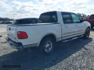 2001 Ford F-150 SuperCrew XLT with VIN 1FTRW07W91KE36030, listed as a IAAI auction lot 41718146 with 235,814 mi miles. Bid and sale history available at carsss.com. Image 4.