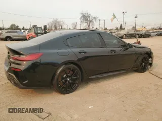 2022 BMW 8 Series M850i with VIN WBAGV8C02NCK08667, listed as a Copart auction lot 88255605 with 22,737 mi miles and Salvage title. Bid and sale history available at DreamBid. Image 3.