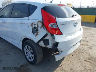 2014 Hyundai Accent GS with VIN KMHCT5AE8EU155466, listed as a IAAI auction lot 41905867 with 129,178 mi miles. Bid and sale history available at carsss.com. Image 6.