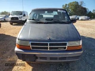 1992 Dodge Caravan z VIN 2B4GH2535NR705117, wystawiony jako Copart lot #77091264 z przebiegiem 174 008 mil mil oraz Szkody całkowita. Historia ofert i sprzedaży dostępna na DreamBid. Obrazek 5.