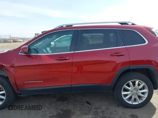 2015 Jeep Cherokee Limited with VIN 1C4PJMDSXFW577462, listed as a IAAI auction lot 41788083 with 155,120 mi miles and . Bid and sale history available at DreamBid. Image 15.