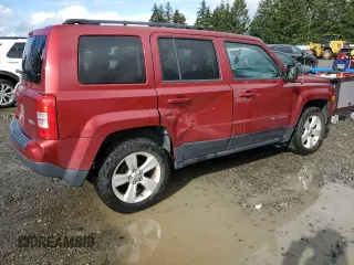 2014 Jeep Patriot Latitude with VIN 1C4NJRFB1ED651525, listed as a Copart auction lot 52526975 with 135,088 mi miles and Salvage Title. Bid and sale history available at carsss.com. Image 3.