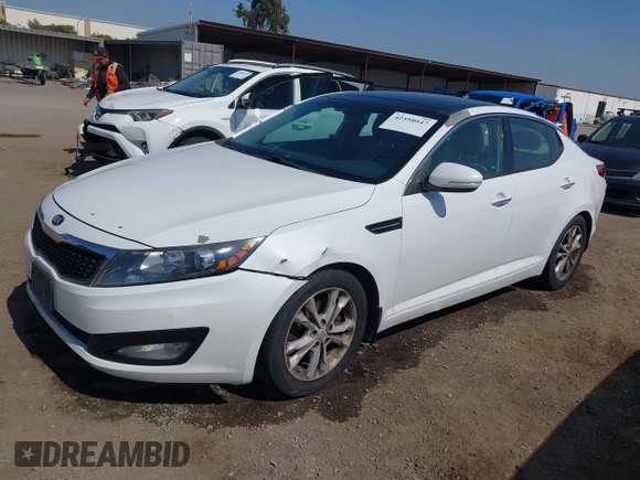 2013 Kia Optima EX with VIN 5XXGN4A74DG258769, listed as a IAAI auction lot 42598047 with 165,605 mi miles and . Bid and sale history available at DreamBid. Image 2.