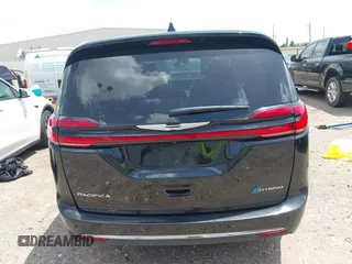 2023 Chrysler Pacifica Hybrid Touring L with VIN 2C4RC1L70PR622000, listed as a IAAI auction lot 42711826 with 65,109 mi miles and . Bid and sale history available at DreamBid. Image 17.