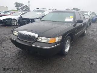 1999 Mercury Grand Marquis LS with VIN 2MEFM75W5XX727746, listed as a IAAI auction lot 41464968 with 216,271 mi miles. Bid and sale history available at carsss.com. Image 17.