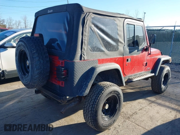 1997 Jeep Wrangler SE z VIN 1J4FY29PXVP476036, wystawiony jako IAAI lot #41882559 z przebiegiem 82 888 mil mil oraz . Historia ofert i sprzedaży dostępna na DreamBid. Obrazek 4.
