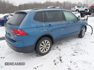 2018 Volkswagen Tiguan S z VIN 3VV0B7AX8JM081263, wystawiony jako IAAI lot #41245308 z przebiegiem 58 778 mil mil oraz . Historia ofert i sprzedaży dostępna na DreamBid. Obrazek 4.