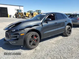 2018 Porsche Macan Turbo z VIN WP1AF2A58JLB70064, wystawiony jako Copart lot #76487994 z przebiegiem Nie podano mil oraz Szkoda całkowita • Salvage title. Historia ofert i sprzedaży dostępna na DreamBid. Obrazek 1.