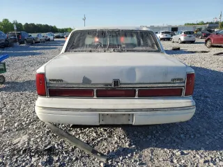 1996 Lincoln Town Car Signature with VIN 1LNLM82WXTY654457, listed as a Copart auction lot 53097635 with 257,446 mi miles and Salvage title. Bid and sale history available at DreamBid. Image 6.