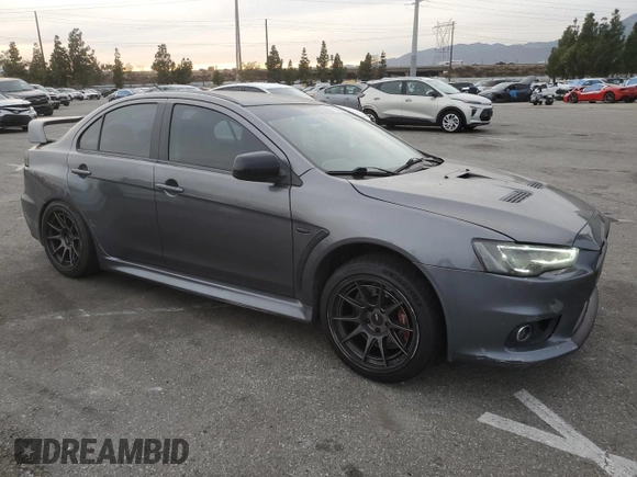 2010 Mitsubishi Lancer Evolution GSR with VIN JA32W8FV1AU027600, listed as a Copart auction lot 84328974 with 88,417 mi miles and Salvage Title. Bid and sale history available at DreamBid. Image 4.