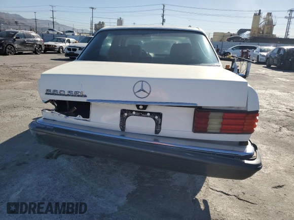 1986 Mercedes-Benz 560 with VIN WDBCA39D6GA238259, listed as a Copart auction lot 89204495 with 106,746 mi miles and Salvage Title. Bid and sale history available at DreamBid. Image 6.