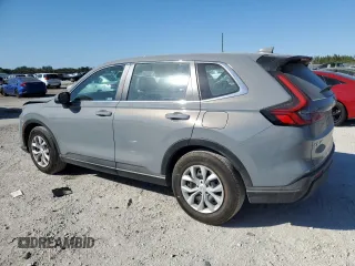 2024 Honda CR-V LX with VIN 2HKRS3H27RH317587, listed as a Copart auction lot 82719674 with 13,509 mi miles and Salvage Title. Bid and sale history available at DreamBid. Image 2.