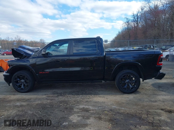 2022 Ram 1500 Limited z VIN 1C6SRFHM3NN412939, wystawiony jako IAAI lot #41813912 z przebiegiem 62 218 mil mil oraz . Historia ofert i sprzedaży dostępna na DreamBid. Obrazek 14.
