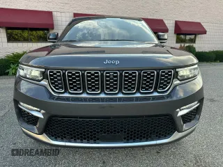 2023 Jeep Grand Cherokee Summit with VIN 1C4RJHEG2P8882566, listed as a Copart auction lot 65095905 with 59,970 mi miles and Salvage title. Bid and sale history available at DreamBid. Image 14.