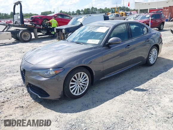 2023 Alfa Romeo Giulia with VIN ZARFAMAN0P7670423, listed as a IAAI auction lot 42842712 with 54,512 mi miles and . Bid and sale history available at DreamBid. Image 2.