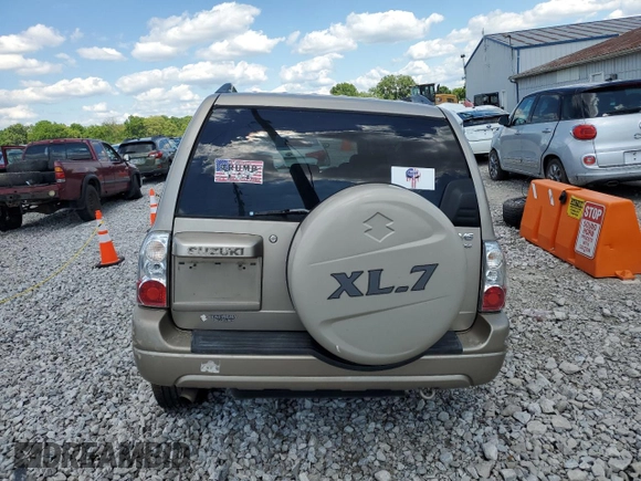 2005 Suzuki XL7 LX z VIN JS3TX92V854105506, wystawiony jako Copart lot #60683524 z przebiegiem 197 035 mil mil oraz Szkody całkowita. Historia ofert i sprzedaży dostępna na DreamBid. Obrazek 6.