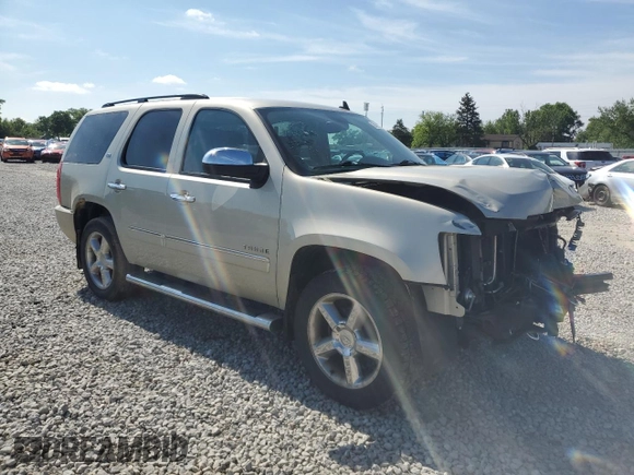 2014 Chevrolet Tahoe LTZ with VIN 1GNSKCE03ER201981, listed as a Copart auction lot 56421125 with 173,710 mi miles and Salvage title. Bid and sale history available at DreamBid. Image 4.