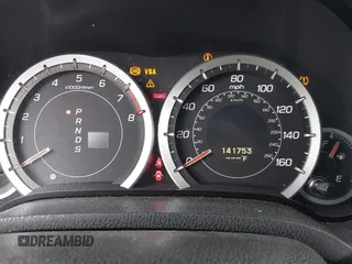 2009 Acura TSX with VIN JH4CU26629C022245, listed as a IAAI auction lot 42154263 with 141,753 mi miles. Bid and sale history available at carsss.com. Image 7.