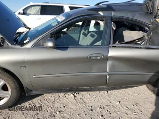 2002 Ford Taurus z VIN 1FAHP59S82A188995, wystawiony jako Copart lot #82141704 z przebiegiem 89 153 mil mil oraz Szkody całkowita. Historia ofert i sprzedaży dostępna na DreamBid. Obrazek 7.
