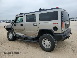 2003 Hummer H2 with VIN 5GRGN23U73H102412, listed as a Copart auction lot 87419024 with 176,456 mi miles and Salvage Title. Bid and sale history available at carsss.com. Image 2.