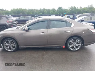2014 Nissan Maxima S z VIN 1N4AA5AP2EC455230, wystawiony jako IAAI lot #42413381 z przebiegiem 182 766 mil mil oraz . Historia ofert i sprzedaży dostępna na DreamBid. Obrazek 14.