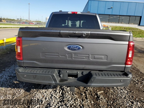 2021 Ford F-150 XL with VIN 1FTFW1E55MFA77310, listed as a Copart auction lot 56179055 with 48,990 mi miles and Salvage title. Bid and sale history available at DreamBid. Image 6.