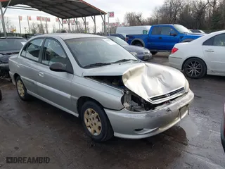 2001 Kia Rio with VIN KNADC123716042067, listed as a IAAI auction lot 41449479 with 113,108 mi miles. Bid and sale history available at carsss.com. Image 1.
