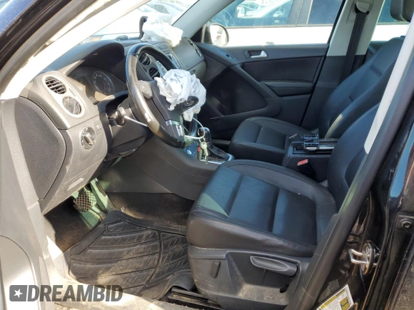 2014 Volkswagen Tiguan SEL with VIN WVGAV3AX5EW558929, listed as a Copart auction lot 71004684 with 125,628 mi miles and Clean title. Bid and sale history available at DreamBid. Image 7.