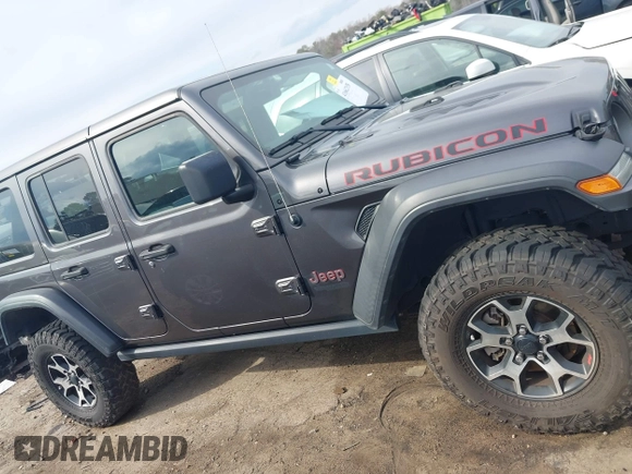 2020 Jeep Wrangler Unlimited Rubicon z VIN 1C4HJXFN8LW176002, wystawiony jako IAAI lot #41662158 z przebiegiem 55 924 mil mil oraz . Historia ofert i sprzedaży dostępna na DreamBid. Obrazek 13.