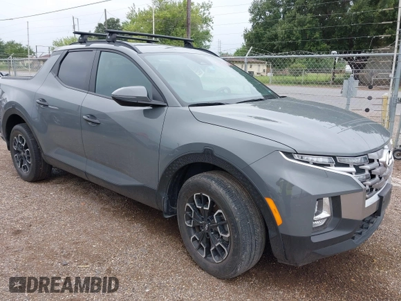 2023 Hyundai Santa Cruz SEL z VIN 5NTJCDAE6PH041342, wystawiony jako IAAI lot #42192227 z przebiegiem Nie podano mil oraz . Historia ofert i sprzedaży dostępna na DreamBid. Obrazek 1.