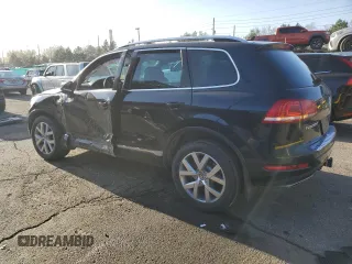 2014 Volkswagen Touareg X z VIN WVGEP9BP5ED008560, wystawiony jako Copart lot #52767595 z przebiegiem Nie podano mil oraz Szkoda całkowita • Salvage title. Historia ofert i sprzedaży dostępna na DreamBid. Obrazek 2.