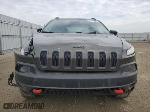 2015 Jeep Cherokee Trailhawk with VIN 1C4PJMBS0FW678738, listed as a Copart auction lot 50651235 with 147,793 mi miles and Salvage title. Bid and sale history available at DreamBid. Image 5.