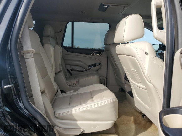 2015 GMC Yukon Denali with VIN 1GKS1CKJ1FR303049, listed as a Copart auction lot 82435514 with 100,693 mi miles and Salvage Title. Bid and sale history available at carsss.com. Image 12.