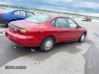 1996 Ford Taurus LX with VIN 1FALP53S2TA221249, listed as a IAAI auction lot 42506786 with 198,272 mi miles and . Bid and sale history available at DreamBid. Image 4.