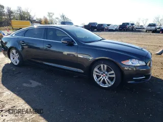 2015 Jaguar XJ Portfolio with VIN SAJWJ2GD1F8V77420, listed as a Copart auction lot 81786334 with 129,190 mi miles and Salvage title. Bid and sale history available at DreamBid. Image 4.