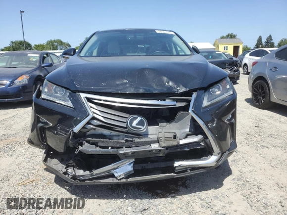 2016 Lexus RX 350 with VIN 2T2BZMCA3GC051837, listed as a Copart auction lot 54097075 with 239,956 mi miles and Salvage Title. Bid and sale history available at DreamBid. Image 5.