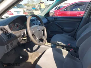 2001 Honda Civic LX with VIN 2HGES16501H614120, listed as a IAAI auction lot 40498991 with 258525 miles. Bid and sale history available at carsss.com. Image 5.