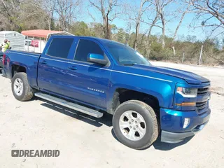 2018 Chevrolet Silverado 1500 LT with VIN 3GCUKREC9JG211391, listed as a IAAI auction lot 41710886 with 113,989 mi miles. Bid and sale history available at carsss.com. Image 1.
