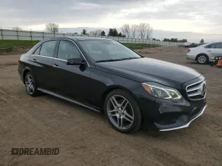 2015 Mercedes-Benz E-Class E 400 with VIN WDDHF6HBXFB082946, listed as a Copart auction lot 54547945 with 213,423 mi miles and Clean Title. Bid and sale history available at carsss.com. Image 4.