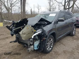 2019 Jeep Cherokee Latitude Plus with VIN 1C4PJLLB4KD382412, listed as a IAAI auction lot 41853246 with 97,512 mi miles. Bid and sale history available at carsss.com. Image 6.