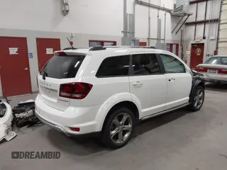 2017 Dodge Journey Crossroad Plus with VIN 3C4PDDGG6HT595397, listed as a IAAI auction lot 42231328 with 125,861 mi miles and . Bid and sale history available at DreamBid. Image 4.