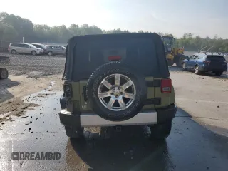 2013 Jeep Wrangler Sahara с VIN 1C4AJWBG0DL593166, выставлен на аукционе Copart как лот 59514185 с пробегом 98 368 миль миль и Списание • Salvage title. История ставок и продаж доступна на DreamBid. Изображение 6.