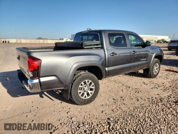 2018 Toyota Tacoma SR5 с VIN 3TMAZ5CN5JM066282, выставлен на аукционе Copart как лот 61197145 с пробегом 85 916 миль миль и Списание • Salvage title. История ставок и продаж доступна на DreamBid. Изображение 3.