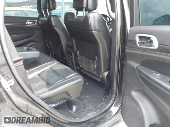 2021 Jeep Grand Cherokee 80th Anniversary with VIN 1C4RJFBG8MC645520, listed as a IAAI auction lot 41920038 with 84,479 mi miles and . Bid and sale history available at DreamBid. Image 8.