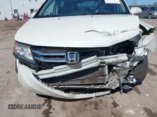 2016 Honda Odyssey EX-L z VIN 5FNRL5H65GB055317, wystawiony jako IAAI lot #41825497 z przebiegiem 117 672 mil mil oraz . Historia ofert i sprzedaży dostępna na DreamBid. Obrazek 6.