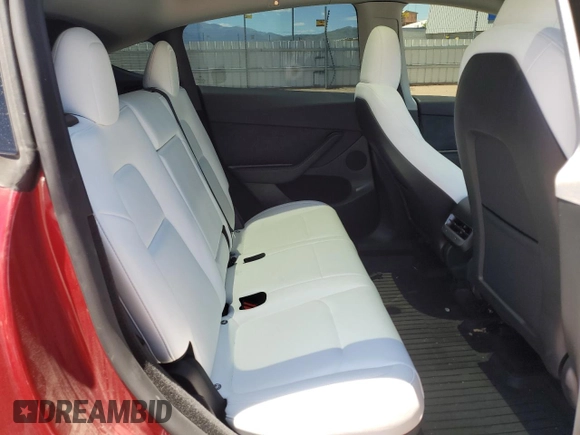 2024 Tesla Model Y Long Range z VIN 7SAYGDEE6RF156183, wystawiony jako Copart lot #61410155 z przebiegiem 27 112 mil mil oraz Szkoda całkowita • Salvage title. Historia ofert i sprzedaży dostępna na DreamBid. Obrazek 10.